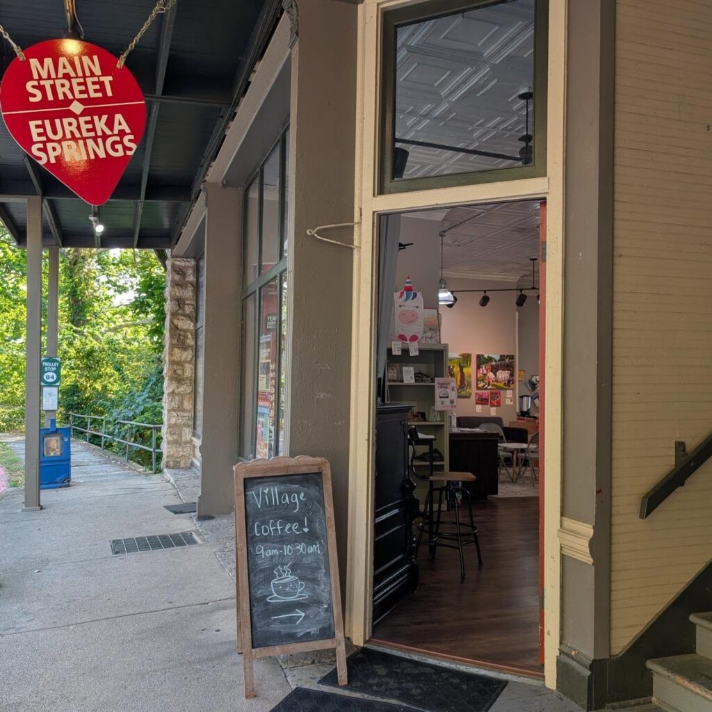 storefront in Eureka Springs advertising Village Coffee